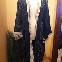 Kaftan. Bordado, Artesanato, Design de moda, Costura, DIY, e Modelagem e confecção projeto de Angeles Irizabal Montes - 13.03.2024