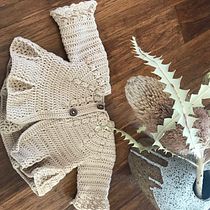 My project in Knitting for Children's Garments course. Design de moda, Tecido, DIY, e Crochê projeto de Elizabeth Fernance - 09.09.2021