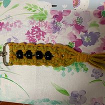 Meu projeto do curso: Repertório de nós de macramê. Un progetto di Design di accessori, Artigianato, Fiber Art e Macramè di Silvia Filipe - 11.09.2021