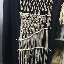 Mi Proyecto del curso: Introducción al macramé: creación de un tapiz decorativo Ein Projekt aus dem Bereich Erweiterungsentwicklung, H, werk, Innendesign, Dekoration von Innenräumen, Weben und Makramee von Abby Villarreal - 29.09.2021