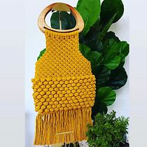 Mi Proyecto del curso: Diseño y elaboración de bolsos en macramé. Design, Design de acessórios, Artesanato, Costura, Tecido, Macramê, e Design têxtil projeto de Aurora Pagan Schelmetty - 15.01.2022