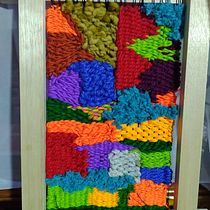 Mi Proyecto del curso: telar colorido. Een project van Ontwerp van accessoires,  Interieurdecoratie, Textiel, Weven y Textielontwerp van Martha Helena Forero Cano - 04.02.2022