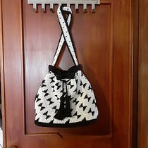 Il mio progetto del corso: Tapestry crochet: una tecnica per disegnare con filo e uncinetto. Design de acessórios, Pattern Design, Tecido, DIY, Crochê, e Design têxtil projeto de Maria Teresa Vittoria Valente - 01.06.2022