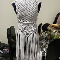 Mi proyecto del curso: Macramé: crea prendas de ropa únicas. Un proyecto de Diseño de complementos, Artesanía, Tejido, Macramé y Diseño textil de Yesica Palacio - 07.06.2022