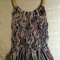 Mi proyecto del curso: Diseño y elaboración de bolsos en macramé. Un projet de Design , Création d'accessoires, Artisanat, Couture, Art textile, Macramé , et Design textile de ojosdeperroazul1973 - 06.10.2022