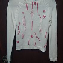 Mi proyecto del curso: Bordado con lana sobre prendas de punto. Un proyecto de Bordado, Tejido y Diseño textil de Irma Romero Sánchez - 15.11.2022