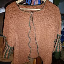 Il mio progetto del corso: Top-down: capi interi all'uncinetto. Un progetto di Fashion design, Fiber Art, DIY, Uncinetto e Textile Design di Elisa Manganelli - 09.12.2022
