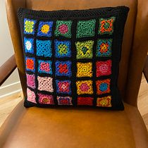 My project for course: Granny Square Crochet: Make Your Own Sweater. Fashion Design, Fiber Arts, DIY, Crochet, and Textile Design project by mariaariasevans - 12.21.2022