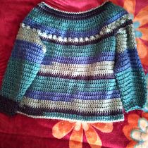 Mi proyecto del curso: Crochet: diseña prendas y patrones con tejido circular. Projekt z dziedziny Projektowanie dodatków, Projektowanie mod,  Tkactwo, DIY, Sz i dełkowanie użytkownika Lucia Salas - 19.08.2022