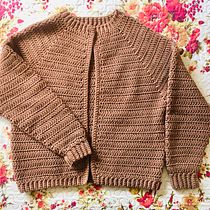 Meu projeto do curso:  Top-down: roupas de crochê sem costura. Fashion Design, Fiber Arts, DIY, Crochet, and Textile Design project by Thaís Terra - 02.05.2023
