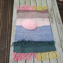 My project for course: Tapestry Techniques for Rug Weaving - sunrise. Un projet de Création d'accessoires, Artisanat, Décoration , et Décoration d'intérieur de Jo Ullah - 12.02.2023