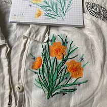 My project for course: Embroidery and Fabric Painting for Beginners. Painting, Pattern Design, Embroider, DIY, Upc, cling, and Textile Design project by Erin Murillas - 02.22.2023