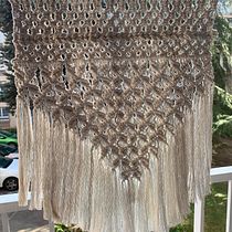 Meu projeto do curso: Macramê: nós básicos e complexos. Accessor, Design, Interior Design, Decoration, Fiber Arts, Macramé, and Textile Design project by tatiana_parreira1 - 03.23.2023