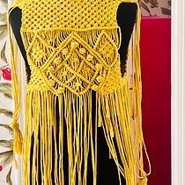 Mi proyecto del curso: Macramé: crea prendas de ropa únicas. Un proyecto de Diseño de complementos, Artesanía, Tejido, Macramé y Diseño textil de Fiammetta Morace - 30.03.2023