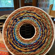 My project for course: Circular Weaving for Colorful Wall Decor. Arts, Crafts, Interior Design, Pattern Design, Fiber Arts, Weaving, and Textile Design project by Karen Devnew - 04.03.2023