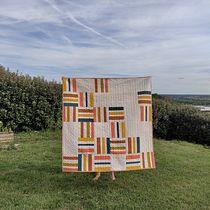 Mon projet du cours :  Création d'une couverture matelassée en patchwork rayé. Un projet de St, lisme, Couture, Art textile, DIY , et Design textile de Marie Grand-Clément - 23.04.2023