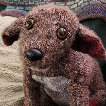 My project for course: Knitting Realistic Stuffed Animals: Make a Puppy from Yarn. Fiber Arts, DIY, Knitting, and Textile Design project by Karen Korby - 04.24.2023