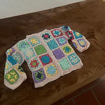 Mi proyecto del curso: Grannies de crochet: haz tu propio suéter. Fashion Design, Fiber Arts, DIY, Crochet, and Textile Design project by Olga Santos - 05.30.2023