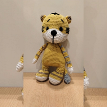Mi tigresito. Arts, Crafts, Fiber Arts, Art To, s, Creating with Kids, Crochet, and Amigurumi project by mica_acu_94 - 05.28.2023