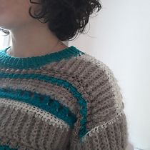 Mon projet du cours :  Vêtements au crochet colorés et riches en textures. Un progetto di Fashion design, Fiber Art, Uncinetto e Textile Design di Giulia Cencetti - 19.06.2023