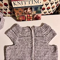 My project for course: Top-Down: One-Piece Crocheted Garments. Fashion Design, Fiber Arts, DIY, Crochet, and Textile Design project by Kenesha Williams - 07.21.2023