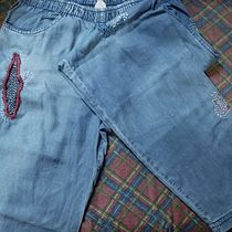 Meu projeto do curso: Bordado: conserto de roupas. Bordado, Costura, DIY, Upc, cling, e Design têxtil projeto de Letícia Tavares Batista - 29.07.2023