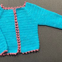 Mi proyecto del curso: Top-down: prendas a crochet de una sola pieza. Fashion Design, Fiber Arts, DIY, Crochet, and Textile Design project by Sabrina Lima - 09.07.2023