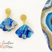 Il mio progetto del corso: Orecchini in argilla polimerica: crea accessori marmorizzati. Un projet de Création d'accessoires, Artisanat, Design de bijoux, St, lisme , et DIY de Noemi Bruschini - 07.09.2023