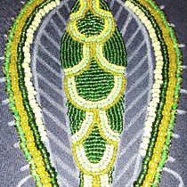 My project for course: Beaded Embroidery Portraits. Een project van Borduurwerk,  Interieurdecoratie y Textielontwerp van Yunuen Villafuerte - 10.01.2024
