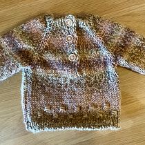 Mon projet du cours : Tricot de vêtements enfants : le raglan top-down. Design de moda, Tecido, Tricô, e Design têxtil projeto de July CB - 26.02.2024