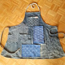Un tablier... griffé!. Un projet de Broderie, Art textile, DIY, Upc, cling , et Design textile de Lucie Thiam Bouleau - 29.02.2024