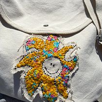 Mon projet du cours : petit sac soleil  . Accessor, Design, Jewelr, Design, Fashion Design, Embroider, and Textile Design project by aldalou - 06.01.2024