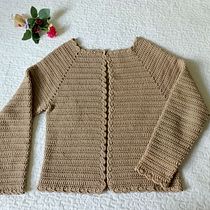 My project for course: Top-Down: One-Piece Crocheted Garments. Fashion Design, Fiber Arts, DIY, Crochet, and Textile Design project by elisaro.27 - 06.17.2024
