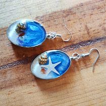 Mi proyecto del curso: Diseño de joyería en resina. Un projet de Création d'accessoires, Artisanat, Design de bijoux , et DIY de amigdacortes - 22.07.2023