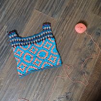 Il mio progetto del corso: Uncinetto: tecniche avanzate per creare capi pieni di colore. Un proyecto de Diseño de moda, DIY, Crochet y Diseño textil de eva_rock80 - 27.08.2024