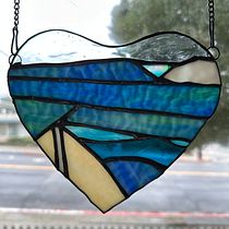 Surfing Heart. Een project van Ontwerp van accessoires,  Interieurdecoratie, DIY e Interieurontwerp van jennifernoland43 - 28.12.2024