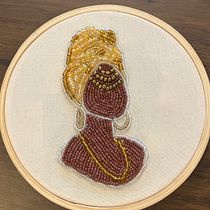 Bordado de Oṣun. Een project van Borduurwerk,  Interieurdecoratie, Ontwerp van accessoires y Textielontwerp van vahmurari - 27.01.2025