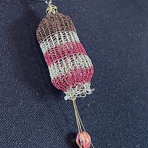 Fiore con pistilli per collana. Un proyecto de Crochet, DIY, Diseño de moda, Tejido, Diseño textil y Artesanía de giovanna.zen - 19.05.2025