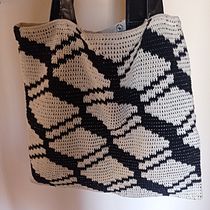 Tote bag Kutiio . Design de acessórios, Crochê, DIY, Tecido, Pattern Design, e Design têxtil projeto de joyce919alves - 04.08.2025