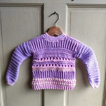 Prenda para niña llena de color y textura. Crochet, Fashion Design, Fiber Arts, and Textile Design project by angiearaya91 - 01.24.2026