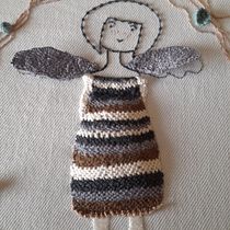 Niña con alas. Een project van Craft, Borduurwerk, Textiel, Traditionele illustratie y Textielontwerp van Danisa Taraborrelli - 02.05.2026