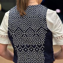 Chalco y cartera cosidas