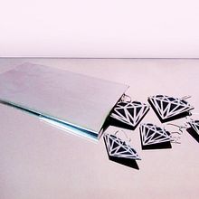 KIT Diamonds Earrings. Een project van  Ontwerp, Fotografie y  Reclame van Alejandro Mazuelas Kamiruaga - 14.04.2011