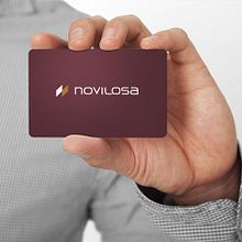 Logotipo para Novilosa, una empresa fabricante de pavimentos y revestimientos cerámicos para multitud de aplicaciones como viviendas, exteriores, piscinas, construcciones industriales, etc.... Een project van  Br, ing en identiteit,  Ontwerp y Grafisch ontwerp van Alejandro Prieto Jaime - 16.10.2009