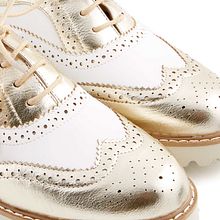 CALZADO OKEYSI. Un proyecto de Fotografía de Cristina Berasategui Verástegui - 25.02.2016