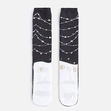 Diseño calcetín Navidad. Colección Otoño/Invierno 2017 Oysho. Un projet de Design , Conception de produits, Design graphique et Illustration traditionnelle de Raquel Sarabia Ruda - 15.11.2017