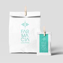 Farmacia Lucía Pinilla. Br, ing e Identidade, Design de logotipo, Design gráfico, e Packaging projeto de Aidearte · estudio de diseño - 13.02.2019