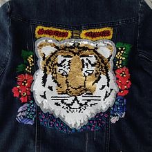 Bolsito de mimbre bordado. Een project van Borduurwerk van angelamaria198708 - 08.03.2020