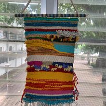 My project in Introduction to Frame Loom Tapestry course. Accessor, Design, Decoration, and Fiber Arts project by Weena Thanachaisakul - 06.20.2021