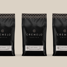 Cremelo Coffee. Design, Packaging, Logo Design, Graphic Design, T, and pograph project by Kevin Craft - 08.17.2021
